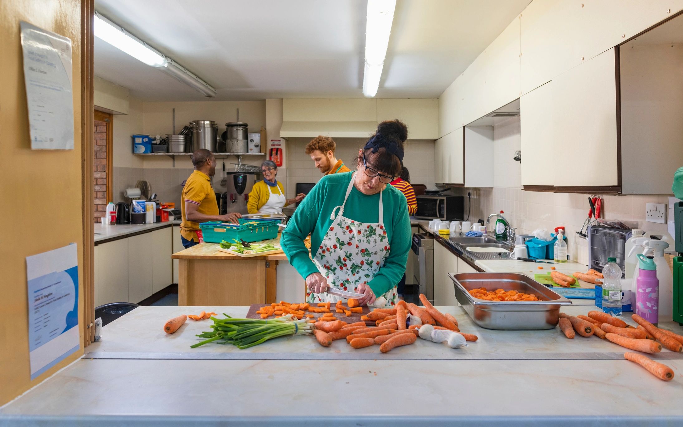 Team members preparing fresh food together