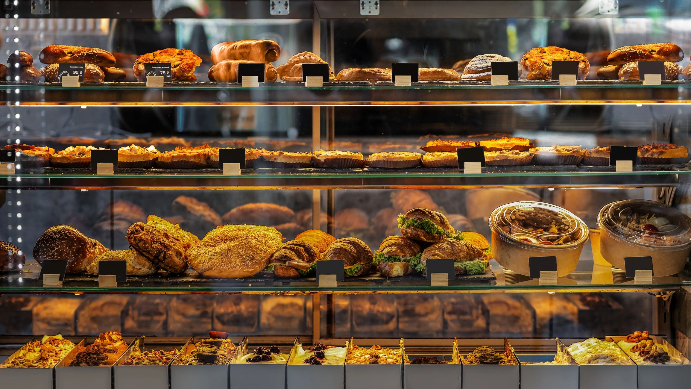 Fresh deli and bakery display with prepared foods